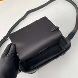 Handle and strap detail of statement everyday-luxe women's handbag – women's designer-style accessory