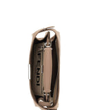 Close-up of Fendi cross body bags hardware and fine stitching