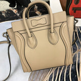 Front view of premium polished women's handbag – women's luxury accessory