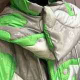 Close-up detail shot of Louis Vuitton luxury clothing with logo-detail design