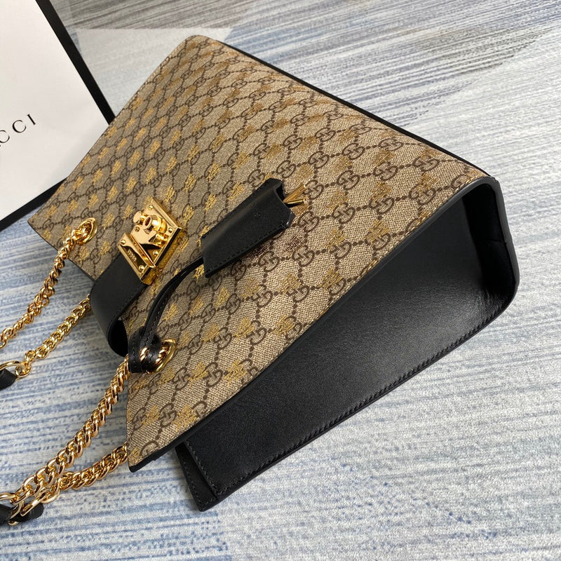 Handle and strap detail of elevated refined women's handbag – women's statement bag