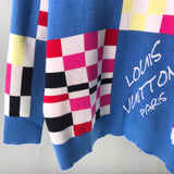 Flat lay presentation of Louis Vuitton luxury clothing with logo-detail design