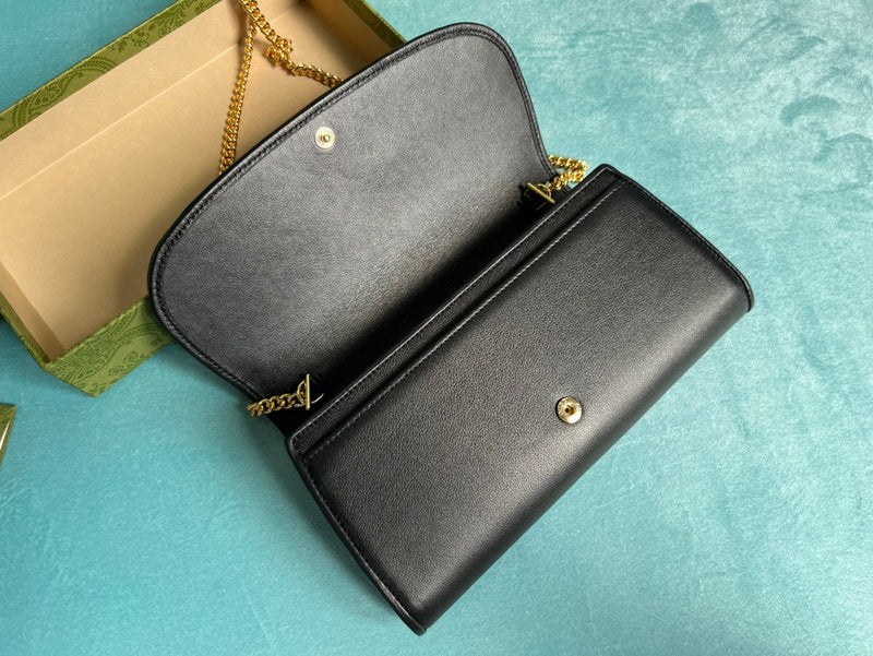 Back view of polished classic women's handbag – women's luxury handbag