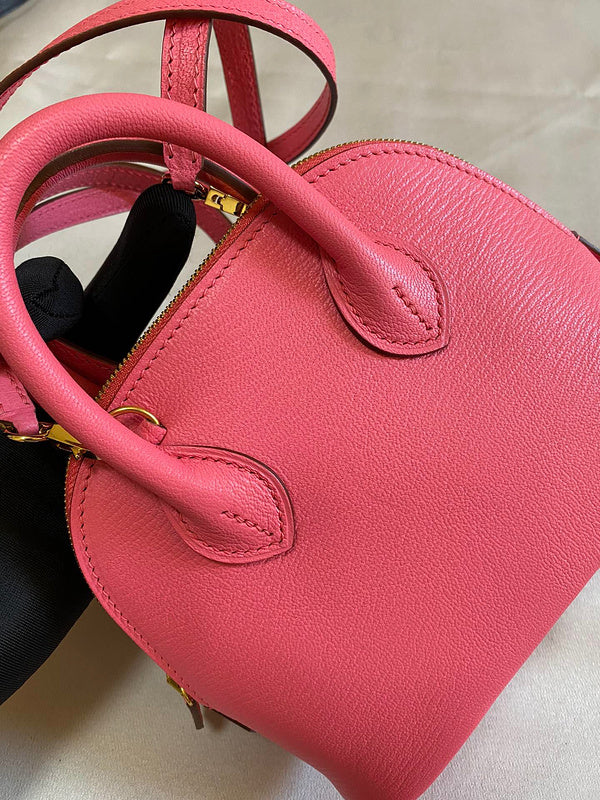 Side view of minimalist structured handbag