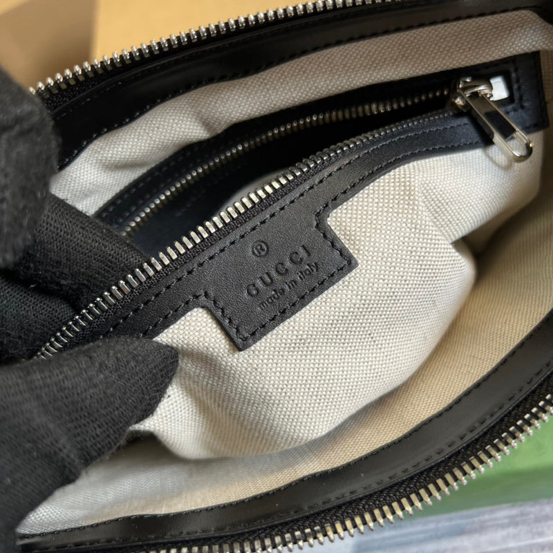 Close-up detail of structured everyday-luxe women's handbag – women's luxury handbag