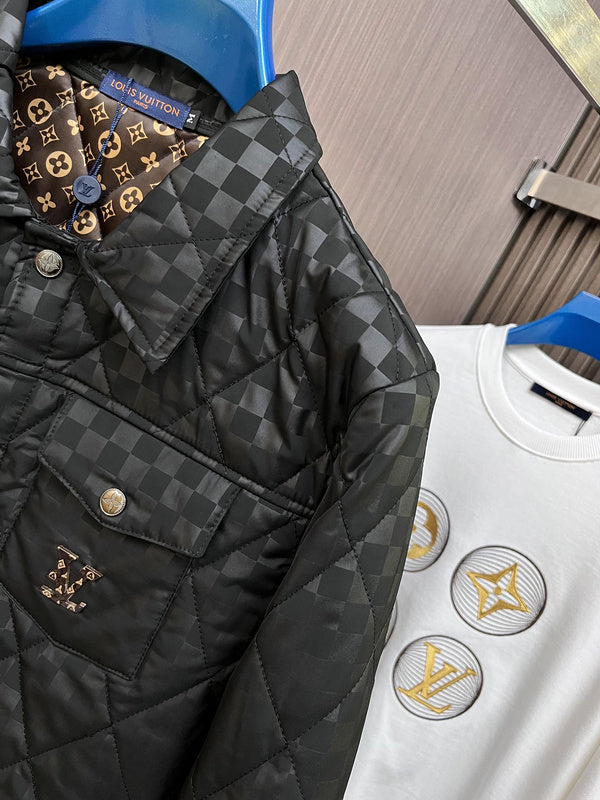 Flat lay presentation of Louis Vuitton luxury clothing with streetwear-inspired cut