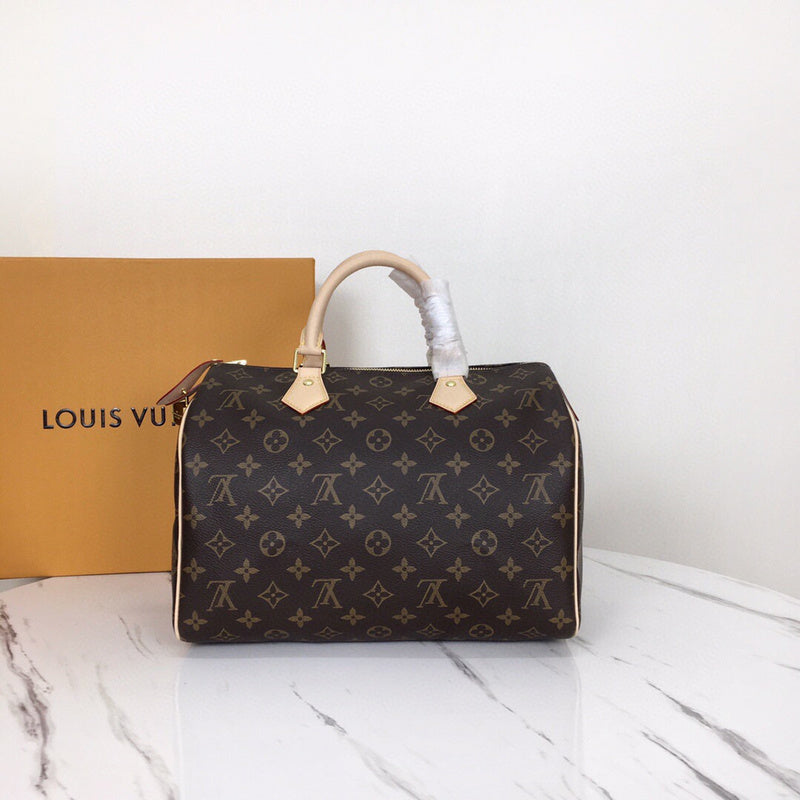 Close-up detail of signature polished women's handbag – women's luxury handbag