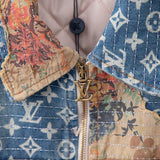 Full styled look of Louis Vuitton luxury clothing with logo-detail design