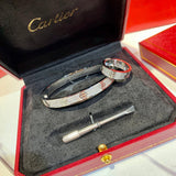 Side view of Cartier unisex jewelry piece