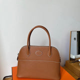Side view of tailored structured handbag
