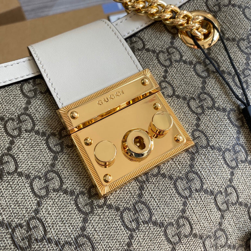 Handle and strap detail of statement refined women's handbag – women's designer-style accessory