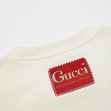 Side profile of Gucci luxury clothing with streetwear-inspired cut