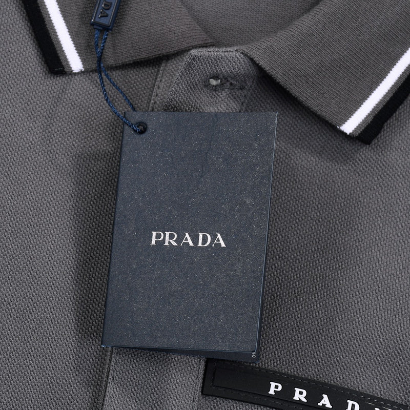 Flat lay presentation of Polo cotton polo shirt with monogram-inspired silhouette