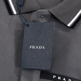 Flat lay presentation of Polo cotton polo shirt with monogram-inspired silhouette