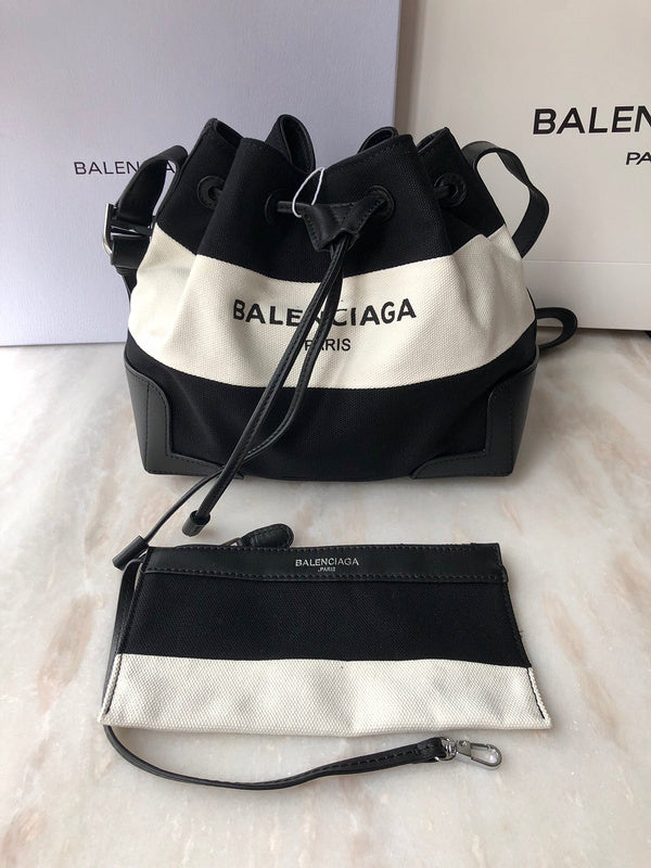 Chic Faux Leather Handbag - Smooth Faux-Leather Exterior | Women's Premium Handbag #836 - side angle view (image 2) of designer-inspired handbag