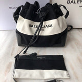 Chic Faux Leather Handbag - Smooth Faux-Leather Exterior | Women's Premium Handbag #836 - side angle view (image 2) of designer-inspired handbag