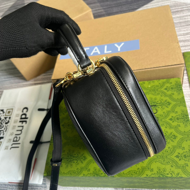 Close-up detail of statement polished women's handbag – women's luxury accessory