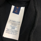 Side profile of Louis Vuitton luxury clothing with tailored silhouette
