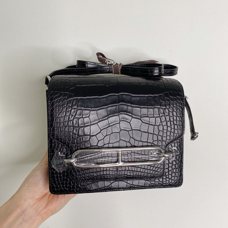 Side view of smart structured handbag