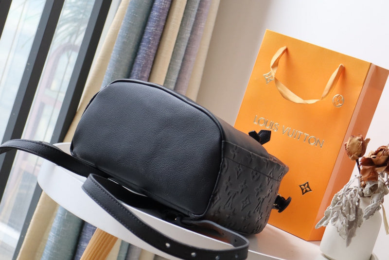Styled lifestyle shot of refined premium women's handbag – women's luxury handbag