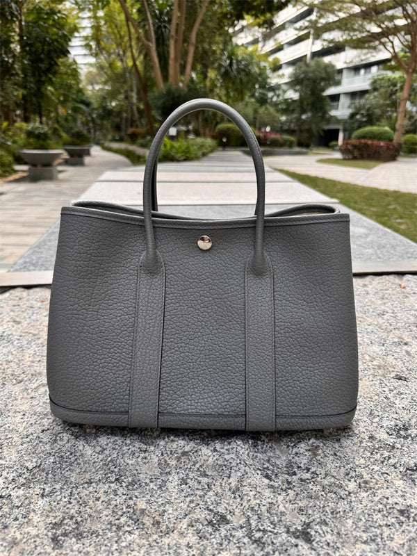Close-up detail of statement bag design