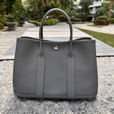 Close-up detail of statement bag design