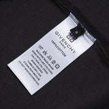 Close-up detail shot of Givenchy luxury clothing with signature branding