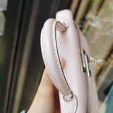  crossbody bag close-up of hardware and finish 11
