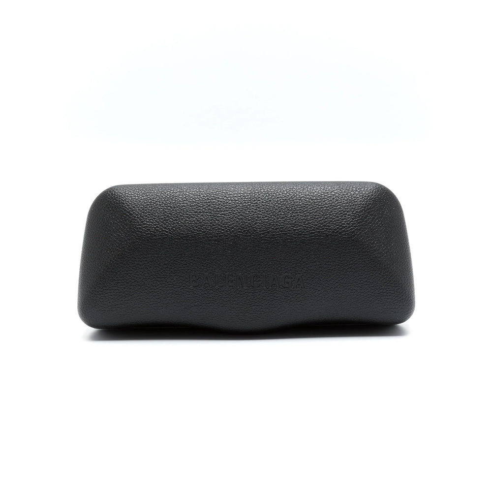 Close-up of Balenciaga sunglasses hardware and fine stitching