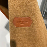 Side profile of Louis Vuitton luxury clothing with contemporary cut