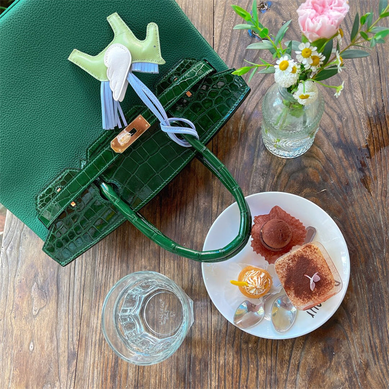  Signature handbag carried on shoulder 10