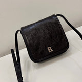 Zivas Charm Modern Edge Statement Handbag (Considered Detail & Form) – Lifestyle Shot