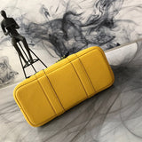 Side view of chic structured handbag