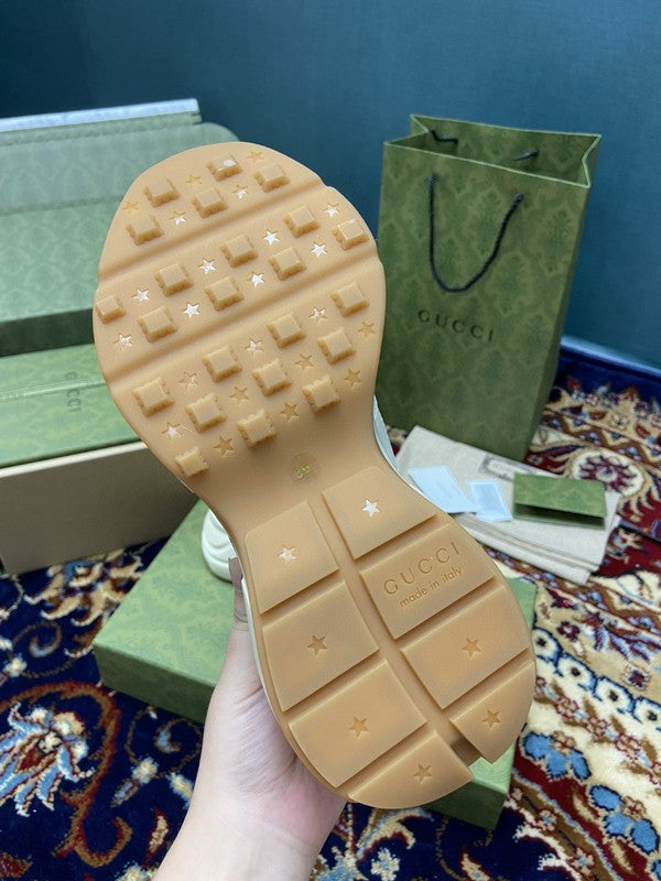 Side profile of Gucci muted earth tones sneakers everyday casual design