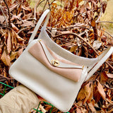 Side view of effortless structured handbag