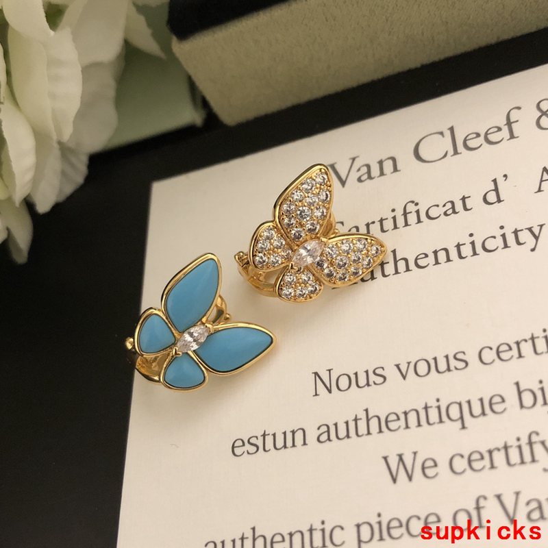 Lifestyle view of Van Cleef & Arpels unisex jewelry piece