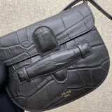 Top view of chic statement women's handbag – women's designer-style accessory