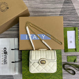 Side profile of classic polished women's handbag – women's statement bag