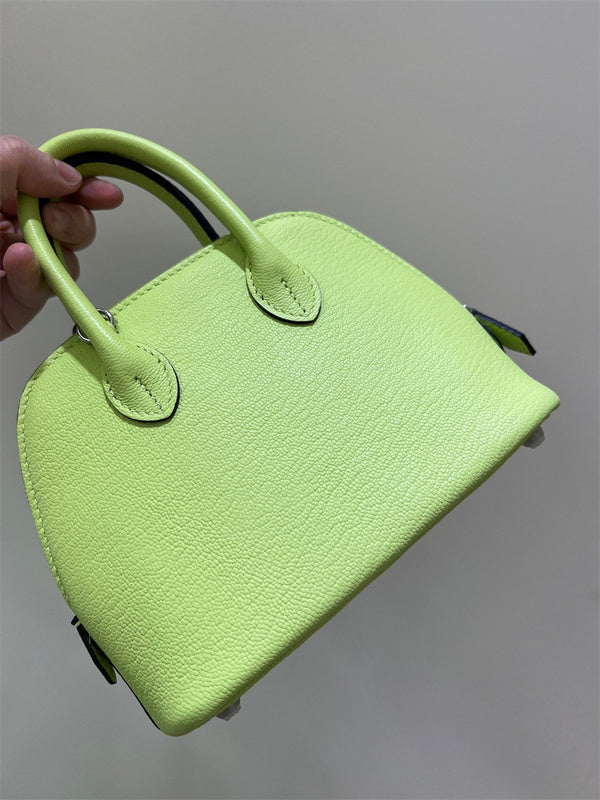 Side view of clean-lined structured handbag