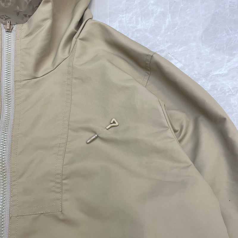 Flat lay presentation of Louis Vuitton luxury clothing with contemporary cut