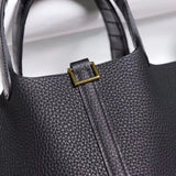 Close-up detail of understated bag design
