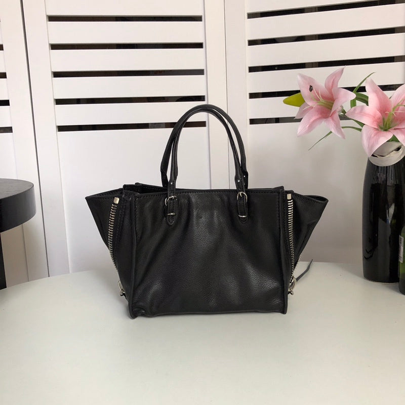 Front view of polished premium women's handbag – women's everyday handbag