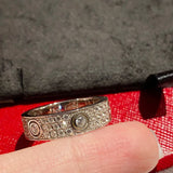Angled view of Cartier unisex jewelry piece