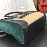 Back view of refined sleek women's handbag – women's designer-style accessory