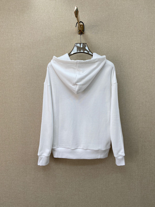 Side profile of Gucci luxury clothing with logo-detail design