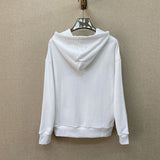 Side profile of Gucci luxury clothing with logo-detail design