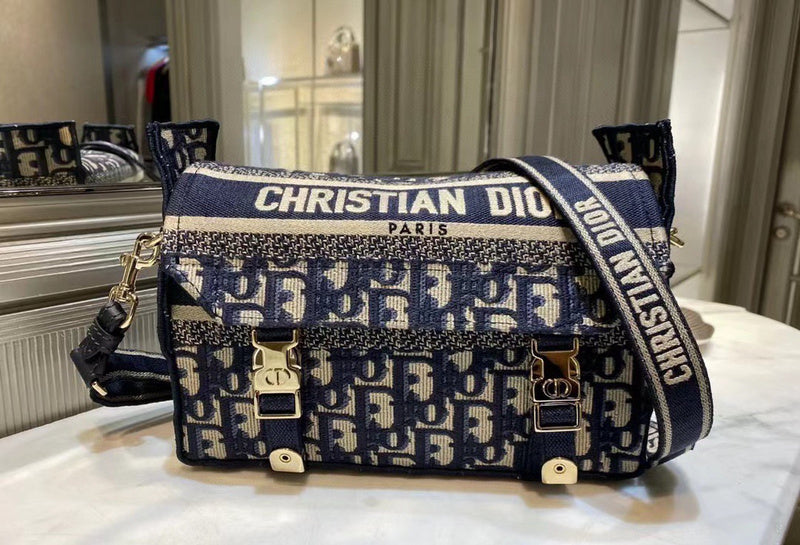 Styled lifestyle shot of structured signature women's handbag – women's designer-style accessory