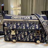 Styled lifestyle shot of structured signature women's handbag – women's designer-style accessory