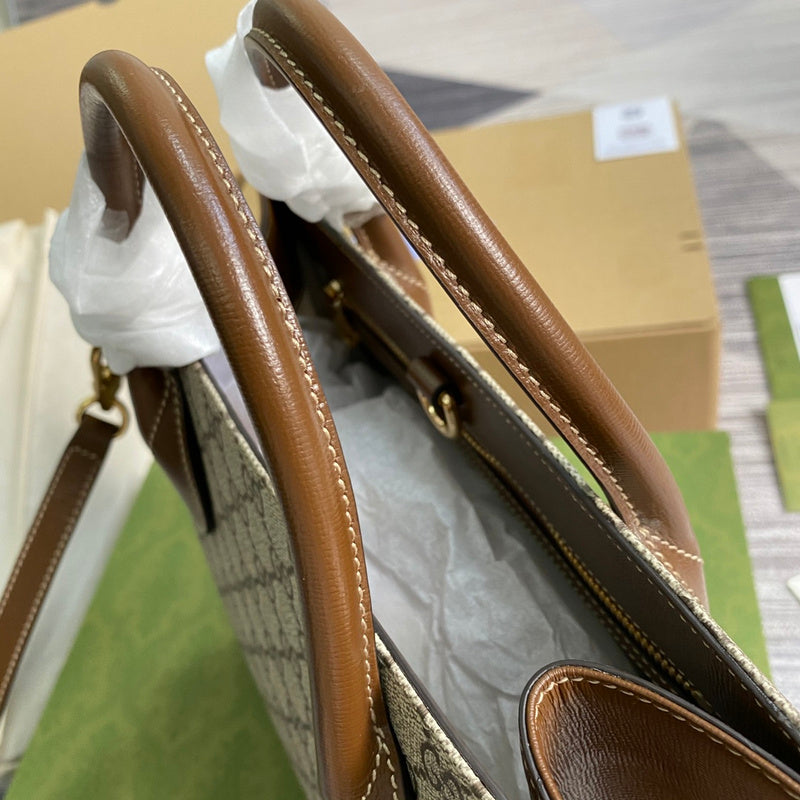 Back view of signature polished women's handbag – women's designer-style accessory