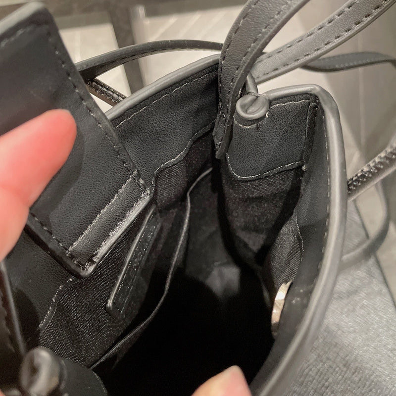 Ziva's Charm handbag – styled view (one versatile size)